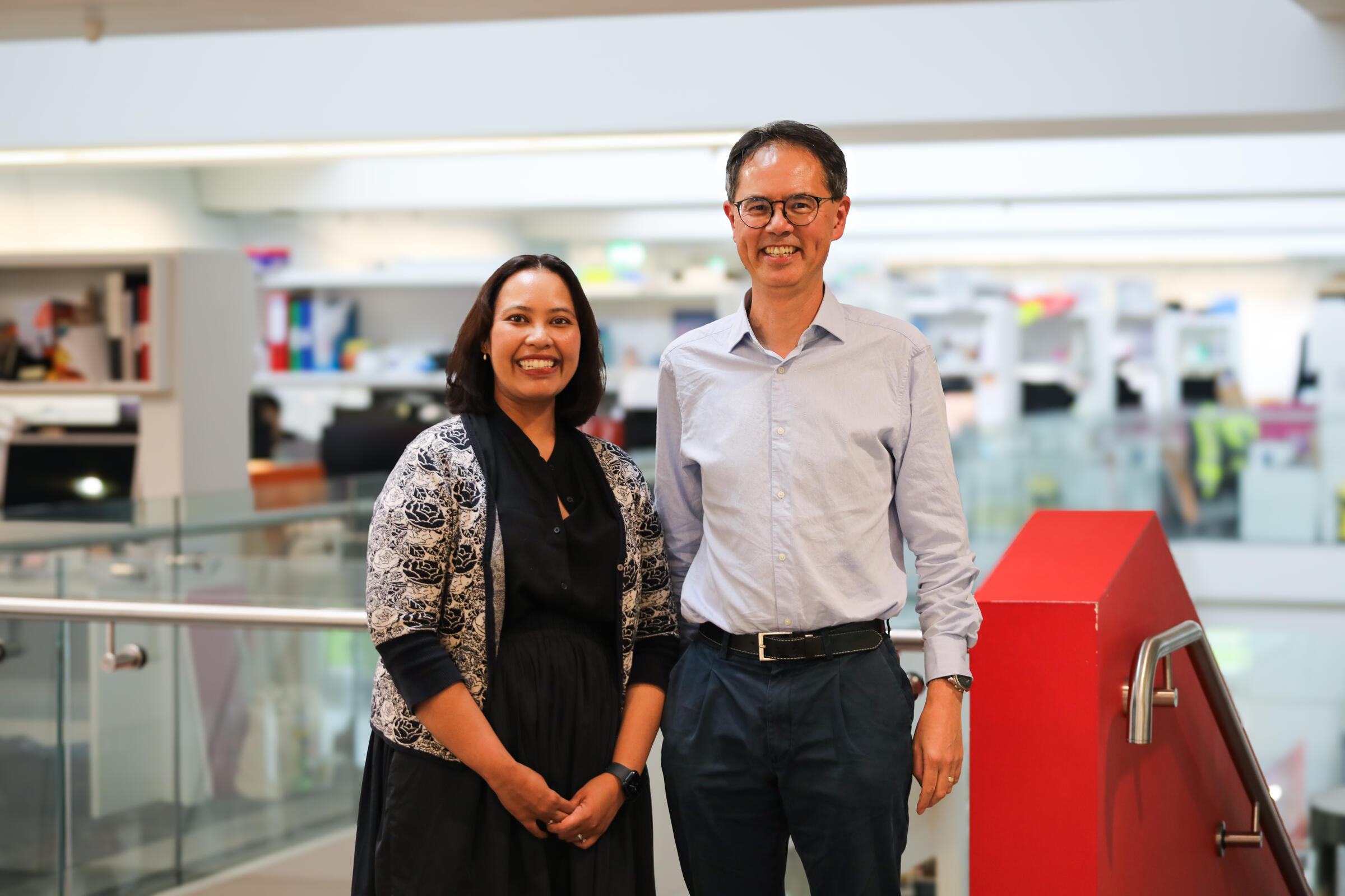 Community member speaking with a researcher